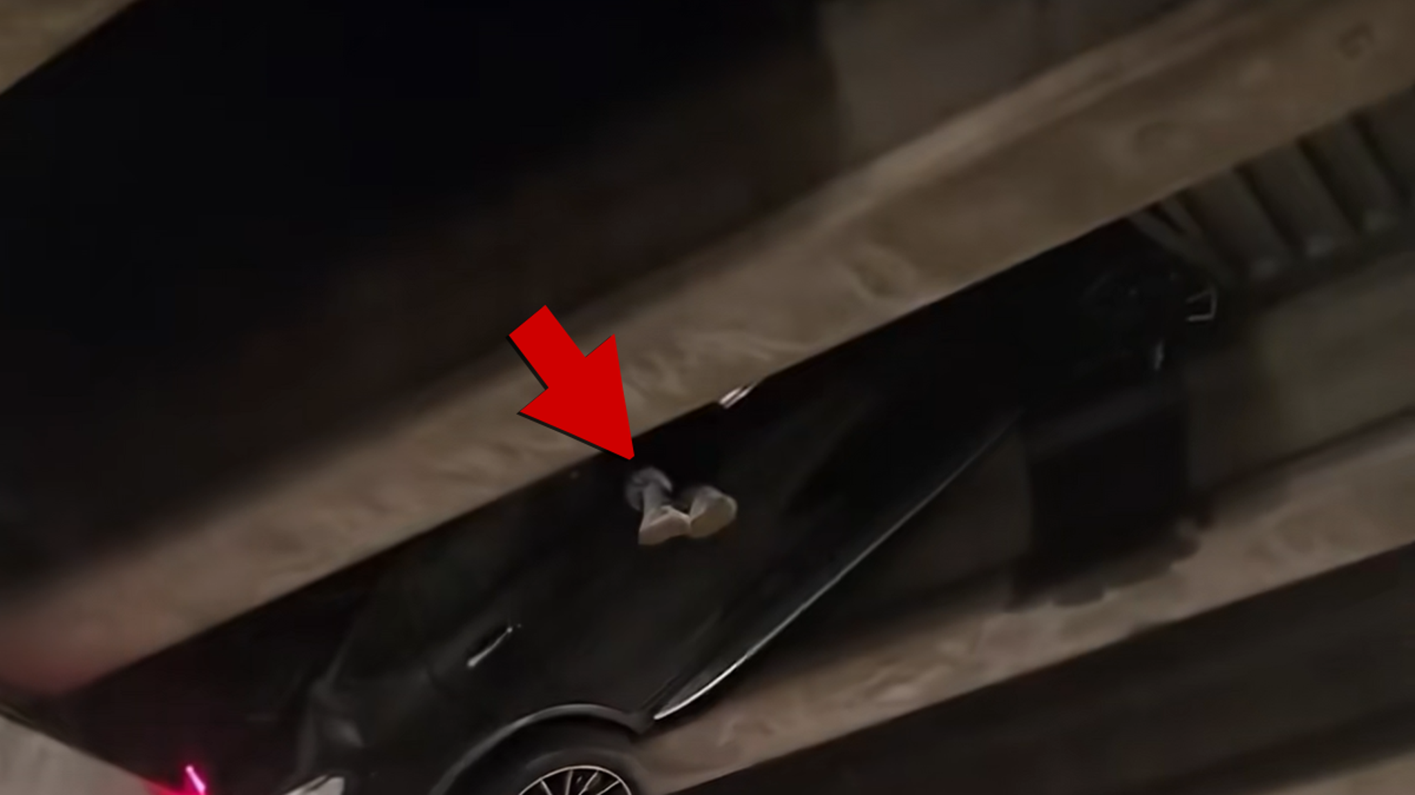 Passenger legs dangle after sedan crashes into Atlanta bypass pillar